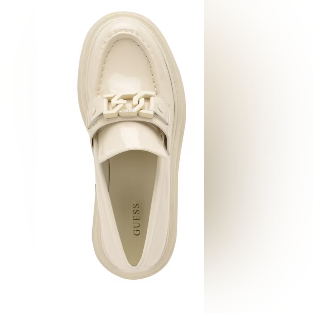 Elevate any look with these polished faux-leather loafers topped with a metal h